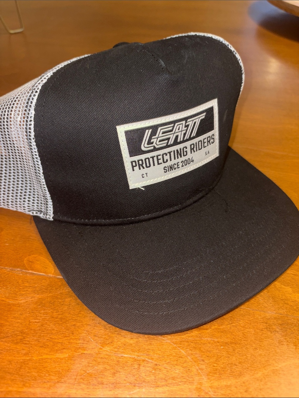 Black & White Trucker Cap - Protecting Riders